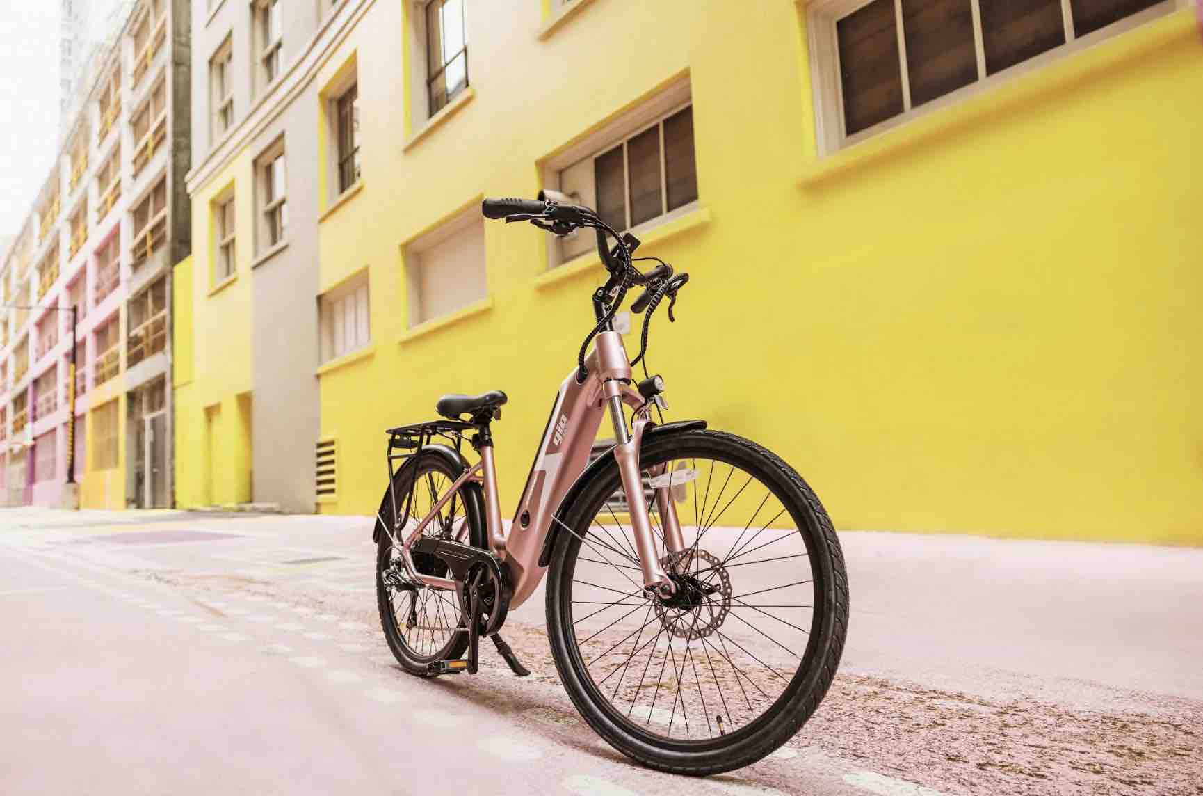 e bike damen 48v 2026 Gio STORM 48V 8 Speed Electric Bike, Integrated Battery Rear Rack — Upzy.com